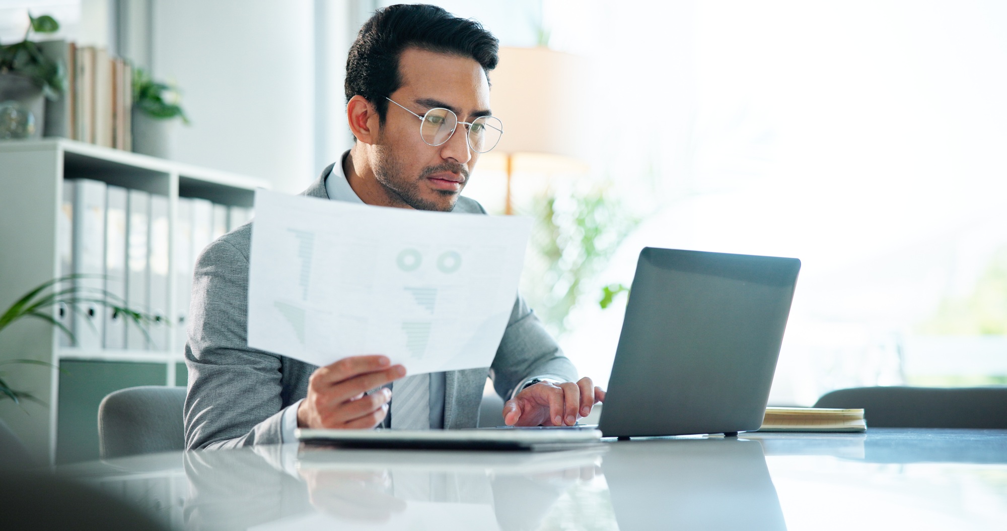 Business, documents and man in office, laptop and email notification with online schedule. Person,